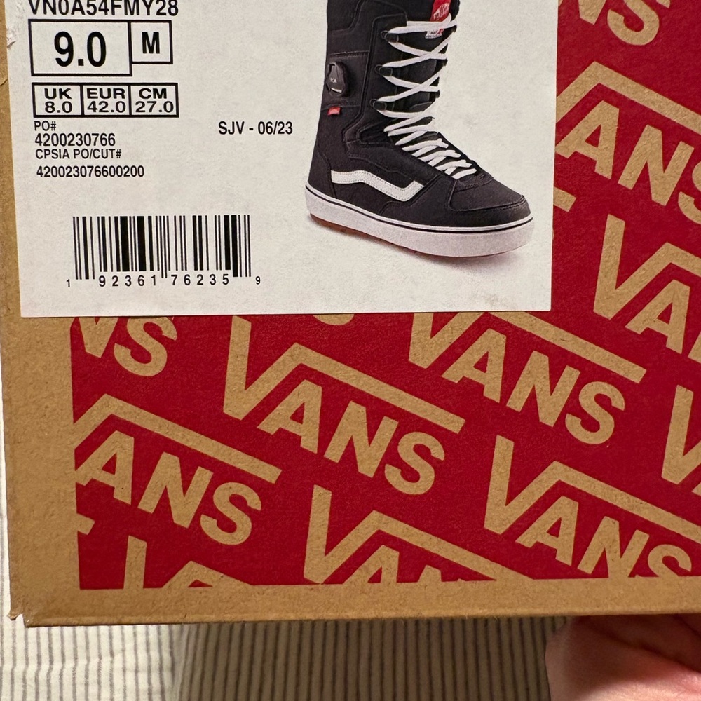 Vans Black and White High-Top Snowboard Boots